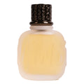 Small beige bottle with a decorative black cap on a white background