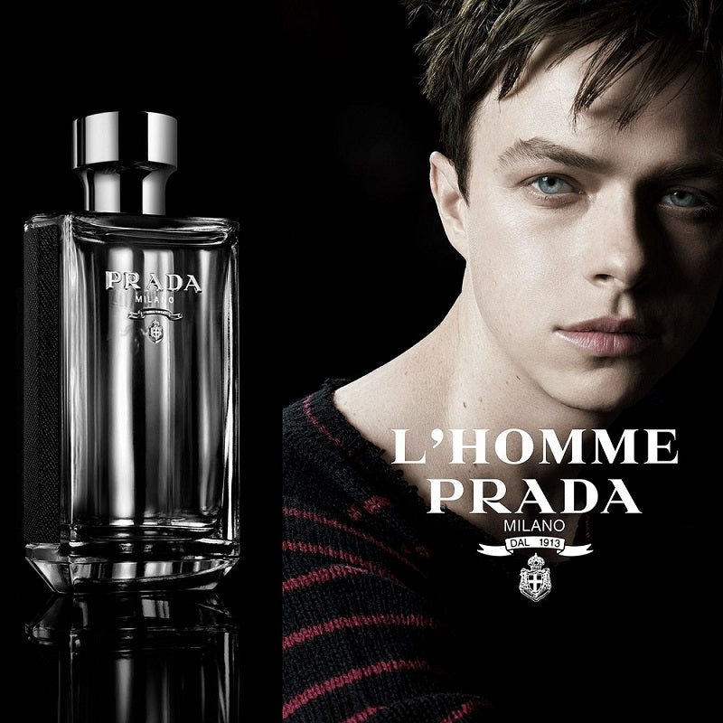 Prada L'Homme perfume bottle with a model in the background