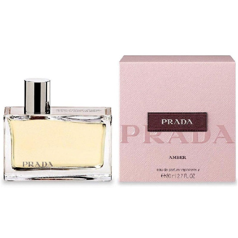 Prada Amber perfume bottle and packaging on a white background