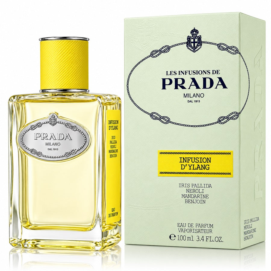 Prada Infusion D'Ylang Eau de Parfum bottle with a yellow cap next to its light green and yellow packaging box.