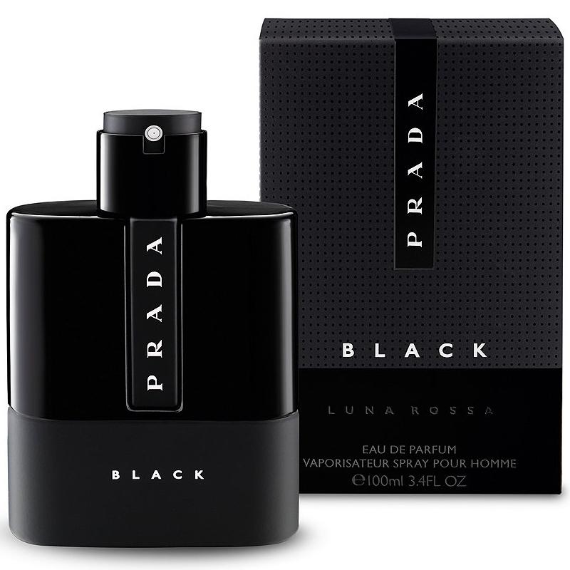 A black bottle of Prada Luna Rossa eau de parfum for men, alongside its packaging box. The bottle has a sleek design with the Prada logo visible.