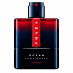 Prada Ocean Luna Rossa Le Parfum bottle, featuring a dark blue to red gradient glass body with a vertical red label displaying the Prada logo, on a solid white background.