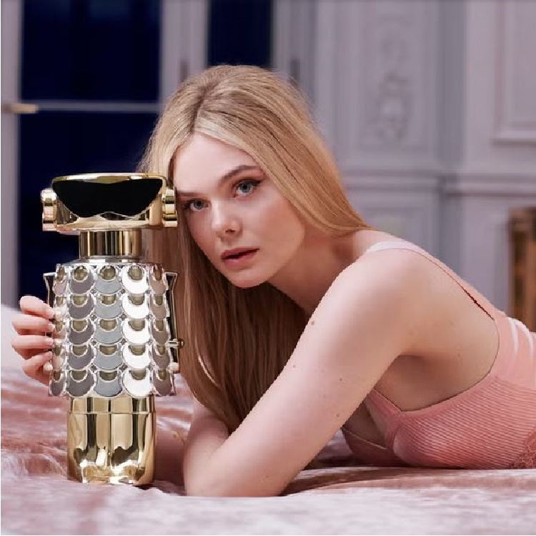 Fame 80 ml Eau de Parfum by Rabanne – captured in a futuristic, radiant setting evoking creativity, confidence, and Parisian cool.