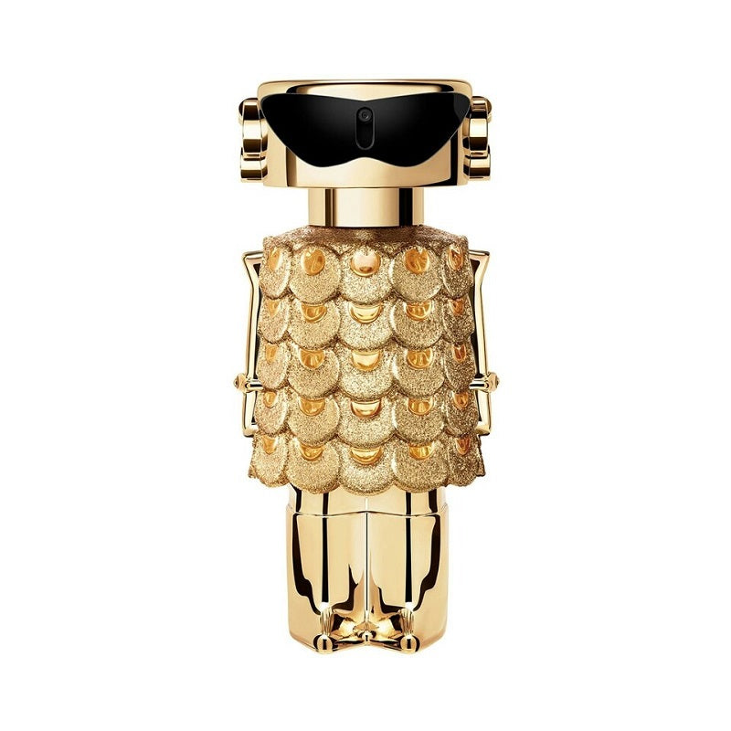 A bottle of Fame Intense Eau de Parfum by Paco Rabanne, featuring a gold-colored design with a pattern resembling scales.