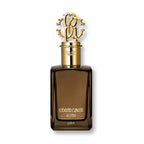 A bottle of Roberto Cavalli Uomo eau de parfum with a distinctive design, featuring a dark tint and a golden cap with an ornate logo.