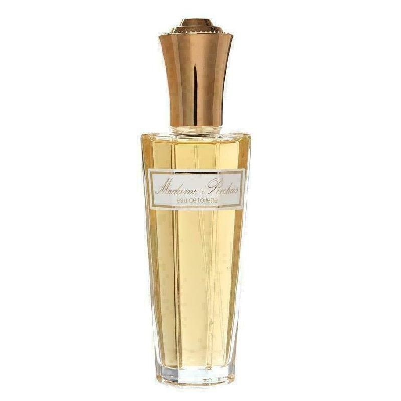 A bottle of Madame Rochas Eau de Toilette by Rochas with a clear yellow liquid visible and a gold-colored cap.