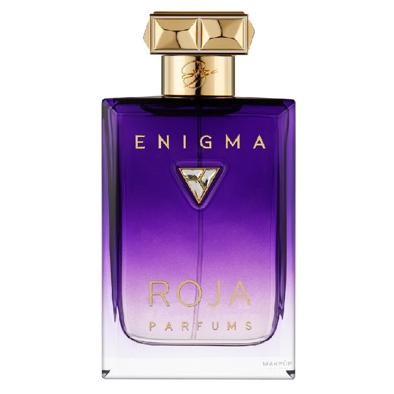 A purple bottle of Enigma Parfum Essence by Roja Dove with a gold cap, labeled with the brand and name.