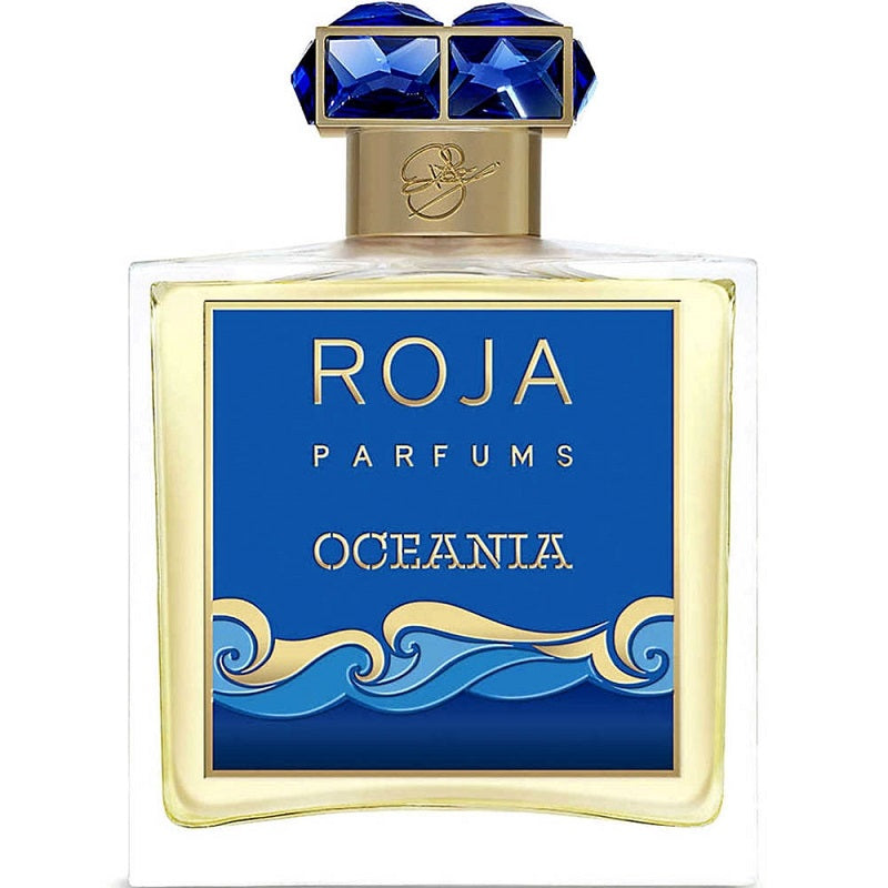 A bottle of Oceana Eau de Parfum by Roja Dove with a blue label and decorative elements, including a golden cap with blue stones.