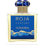A bottle of Oceana Eau de Parfum by Roja Dove with a blue label and decorative elements, including a golden cap with blue stones.