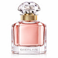 ScentBar Australia Mon Guerlain Eau de Parfum in a clear glass bottle with a gold collar and clover-shaped stopper.