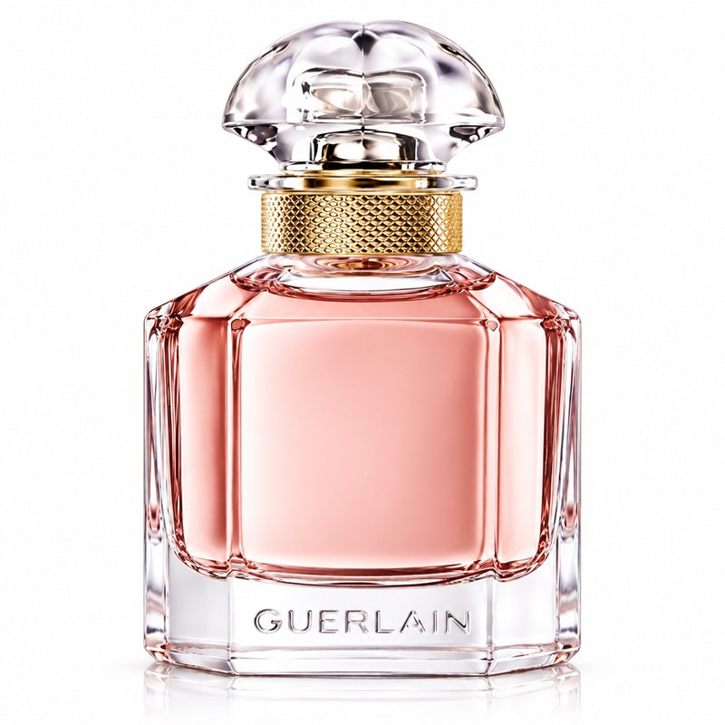 ScentBar Australia Mon Guerlain Eau de Parfum in a clear glass bottle with a gold collar and clover-shaped stopper.