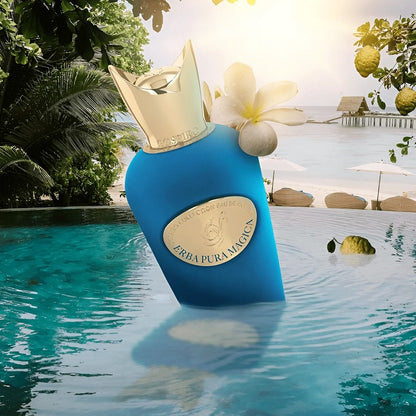 Blue perfume bottle with gold cap in a pool setting