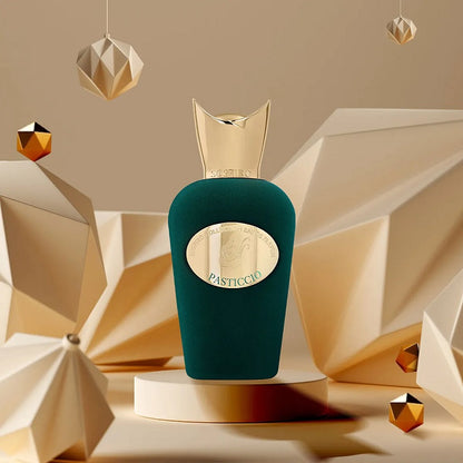 Green perfume bottle with gold cap on a geometric background