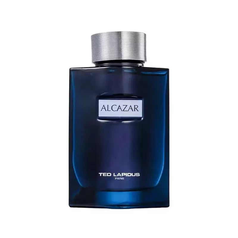 A blue glass bottle of 'Alcazar' eau de toilette by Ted Lapidus with a silver cap.