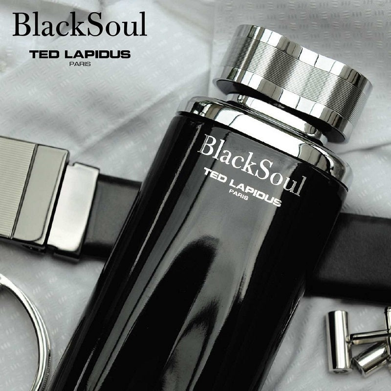 BlackSoul Ted Lapidus perfume bottle with silver cap on a textured surface