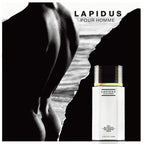 Lapidus pour Homme perfume bottle with a silhouette of a person holding a rock.