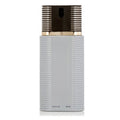 White ribbed spray bottle with gold cap on a white background