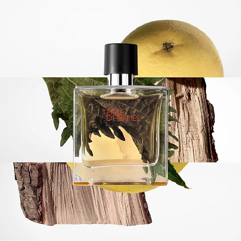 Perfume bottle labeled 'Terre d'Hermes' with a tree bark and leaf background