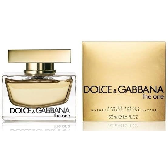 A product image featuring Dolce & Gabbana 'The One' Eau de Parfum, with a clear glass bottle and gold-colored cap, alongside its packaging box.
