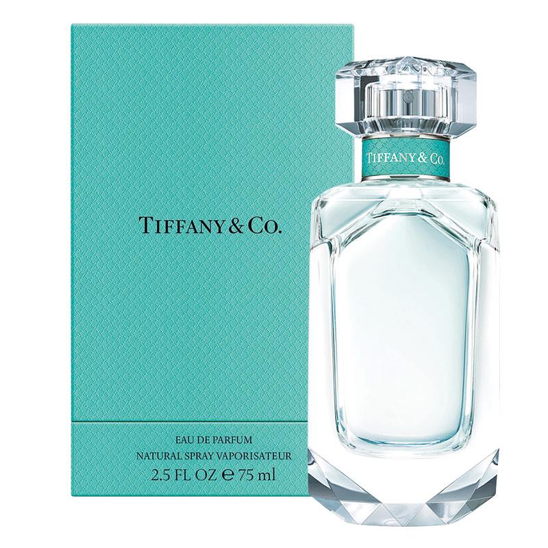 Tiffany & Co. Eau de Parfum in a clear glass bottle with a cap, alongside its blue packaging box.