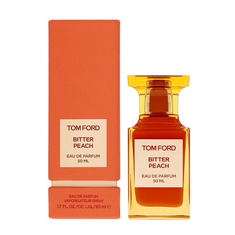 Tom Ford Bitter Peach Eau de Parfum in a yellow glass bottle with a red label, next to its orange packaging box.