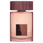 A bottle of Tom Ford's Cafe Rose Eau de Parfum with a pink hue and a ribbed cap.