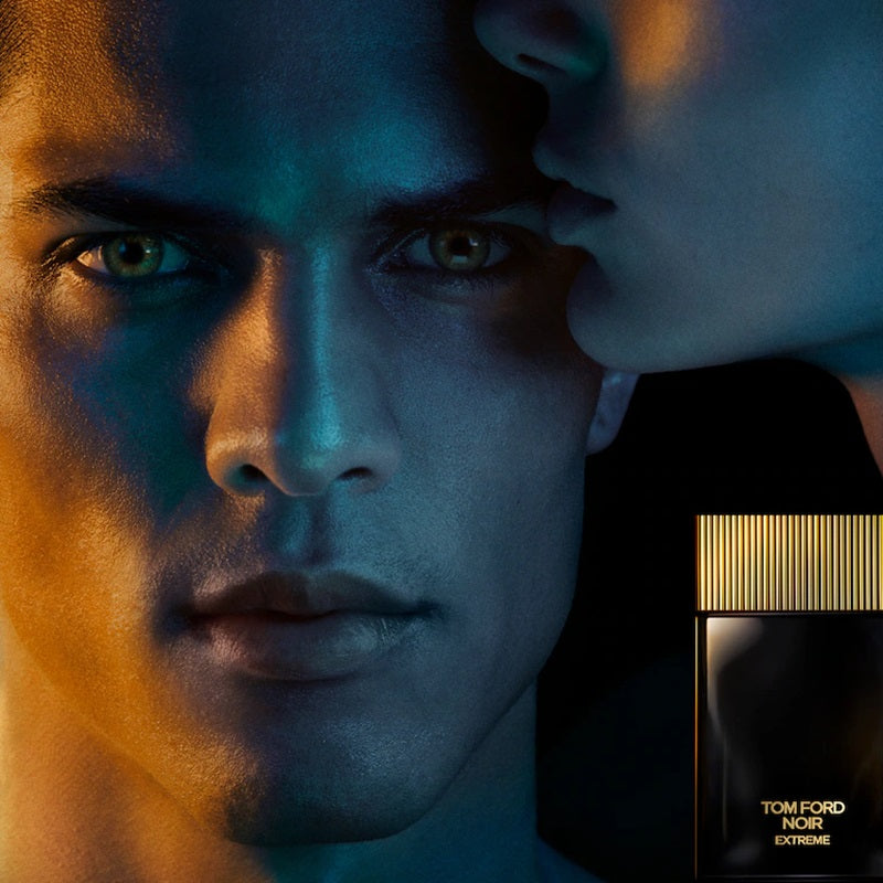 Close-up of a person's face with a Tom Ford Noir Extreme box in the corner.