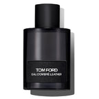 A black bottle of Tom Ford Ombre Leather Eau de Parfum with a simple, elegant design.