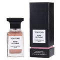 A Tom Ford Rose de Chine Eau De Parfum bottle next to its packaging box.