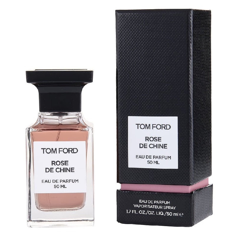 A Tom Ford Rose de Chine Eau De Parfum bottle next to its packaging box.
