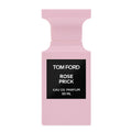 A pink bottle of Tom Ford Rose Prick Eau de Parfum with a black label.