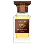 A glass bottle of Tom Ford Santal Blush Eau de Parfum with a brown cap and a label indicating it is a 50ml perfume.