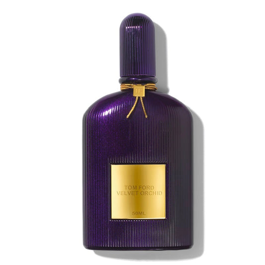 Purple perfume bottle with gold label on a white background