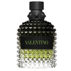 Valentino Uomo Born in Roma Green Stravaganza perfume bottle with black cap and textured green liquid inside.