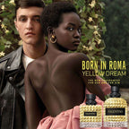 Two people standing together with two bottles of Valentina perfume labeled 'Born in Roma Yellow Dream' in the foreground.