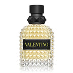 Valentino perfume bottle with black cap on a white background