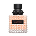 Valentino perfume bottle with black cap on a white background