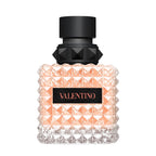 Valentino perfume bottle with black cap on a white background