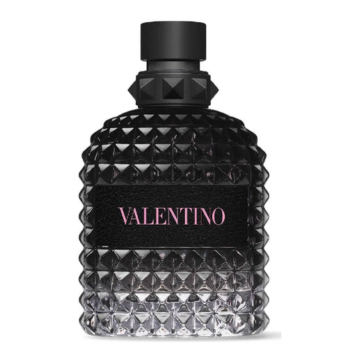 A black bottle of Valantino Uomo Born in Roma eau de toilette with a textured design and the brand name 'VALENTINO' in pink letters.