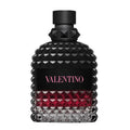 Black and red textured perfume bottle with 'Valentino' branding on a white background