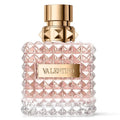 Valentino perfume bottle with gold cap on a white background