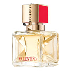 A glass bottle of Valentino Voce Viva eau de parfum with a gold and red cap, labeled with the brand name Valentino.