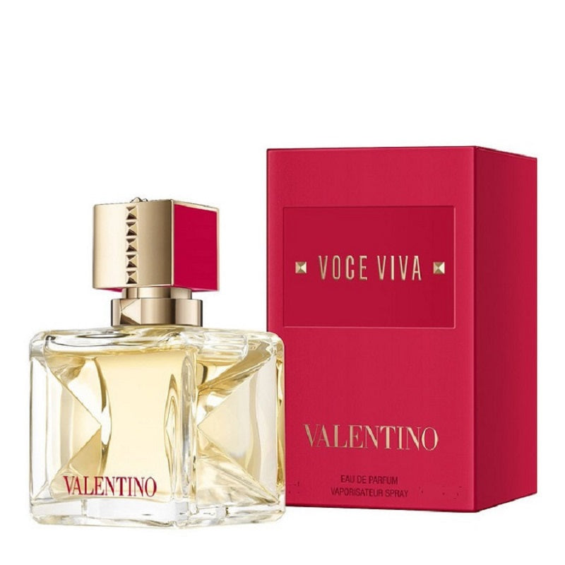 Pack Image: Valentino Voce Viva Eau de Parfum presentation with the luxurious clear glass bottle beside the matching gold and red Valentino retail box on a pure white background.