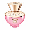 Versace perfume bottle with a pink glass body and a metallic gold cap, featuring the brand's Medusa logo on the front.
