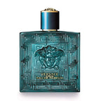 A blue glass bottle of Versace Eros Eau de Parfum with a gold cap and intricate geometric patterns around the body.