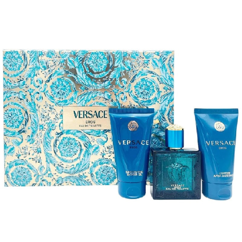 Versace men's grooming set with blue bottles and patterned box on a white background