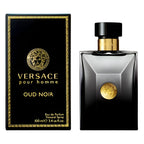 Pack Image: Versace Oud Noir Pour Homme Eau de Parfum presentation with the black bottle beside the matching black and gold luxury retail box on a pure white background.