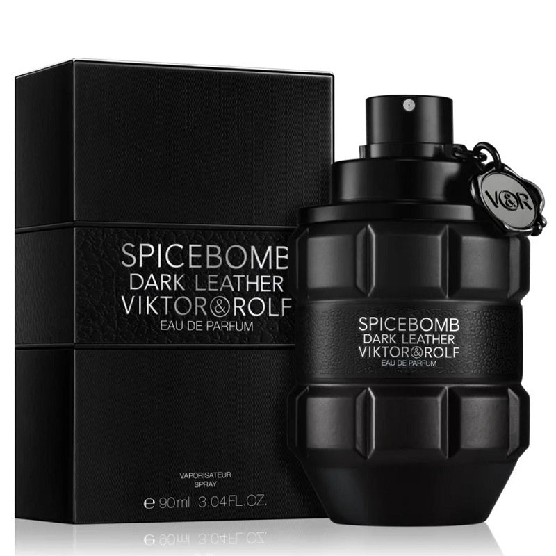 Pack Image: Viktor & Rolf Spicebomb Dark Leather Eau de Parfum presentation with the matte black grenade bottle beside the matching black luxury retail box on a pure white background.