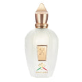 Perfume bottle with gold cap and 'The Renaissance' branding on a white background