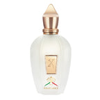 Perfume bottle with gold cap and 'The Renaissance' branding on a white background